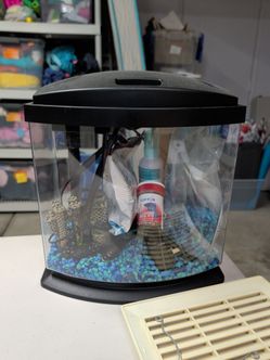 Fish tank with supplies