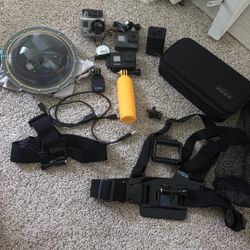 3 Go Pros And All The Accessories, Batteries, Case, Etc