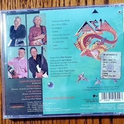 Asia band (Wetton/Howe/Palmer/Downes) CD "Triple X"