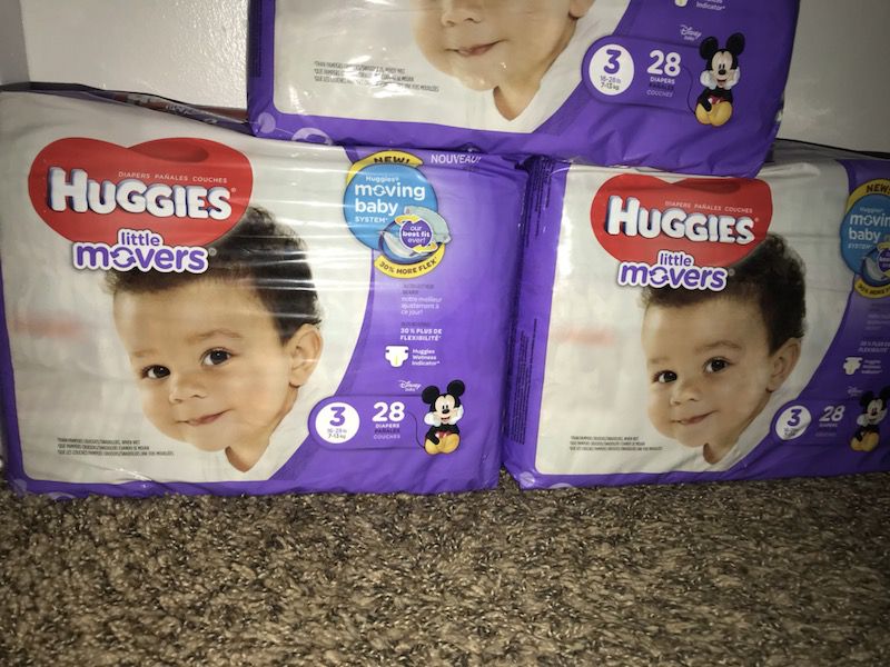3 pack of diapers with 2 packs of huggies wipes