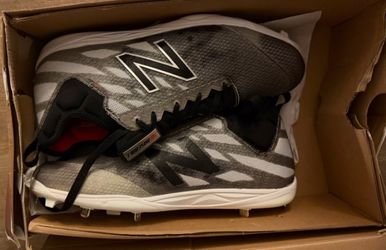 New / New balance baseball metal cleats size 12-1/2. $65