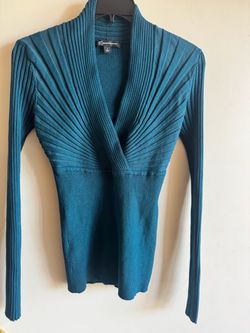 INC Teal ribbed knit top with sculpted pleat detail at the V-neck. Fitted silhouette with long sleeves.