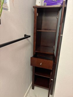 Bathroom cabinet with glass