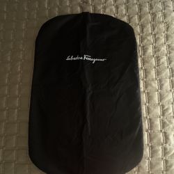 SALVATORE FERRAGAMO   39” x 24” WATERPROOF COVERING , ZIPPERED TRAVEL BAG, STORING SUITS
