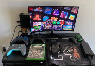 Xbox One With 3 controllers,Charging Station & Games