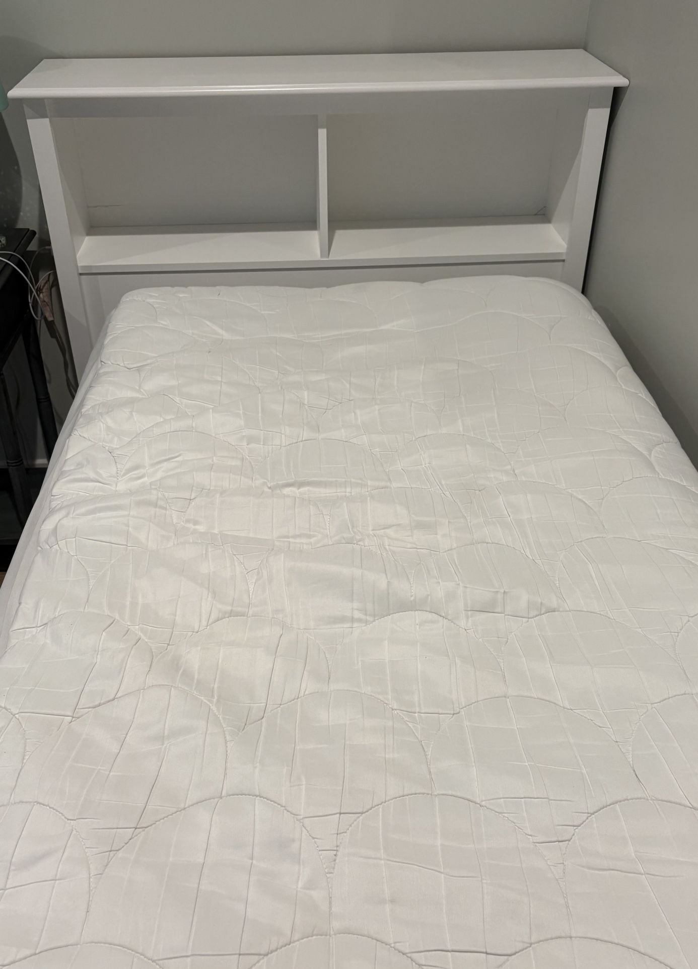 White Twin Bed with Built-In Bookshelf Headboard