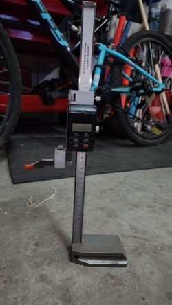 Electronic digital height gauge.