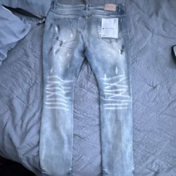 Blue ripped purple jeans 