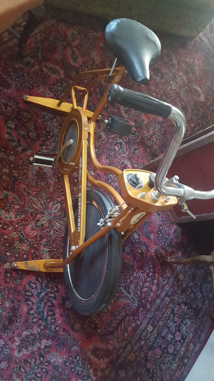 Vintage Schwinn Exerciser stationary bike. Copper color. Good working condition.