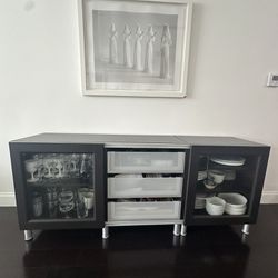 Dining storage unit with sliding doors and drawers
