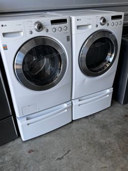 front load lg steam washer and front load lg steam dryer with pedestals