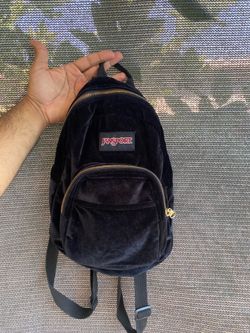 Jansport Half Pint FX Mini Backpack in black velvet.