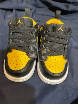 Children’s Jordan’s black and yellow