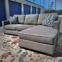 Modern Gray Reversible Chaise Sectional Sofa from Living Spaces