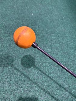 Orange Whip golf training aid