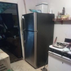 GE Appliances MN-GTS18GSGRSS Stainless Steel Doors And Black Color  Top 1in (25mm) Back 2in(51mm) Sides .75in(19mm)