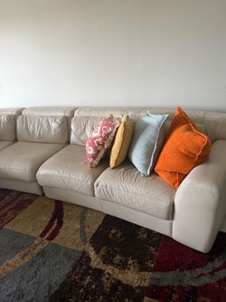 Large Cream Leather Sectional Sofa with Oversized Round Chaise