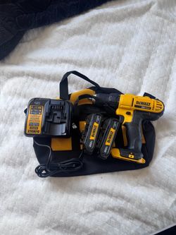Dewalt 20v max 1/2 inch drill with 2 batteries a changer and a bag brand new