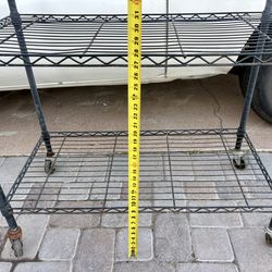Rolling garden cart shelf