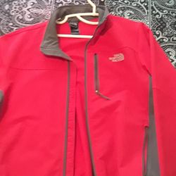 Brand new red and gray North Face jacket