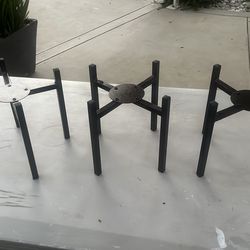3 brown metal plant stand