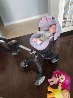 Baby doll stroller and 3 dolls