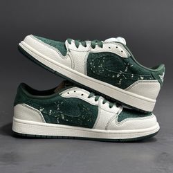 A pair of green and white hooker shoes