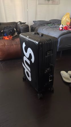 Supeme suitcase black aluminum and white print with few dent