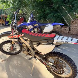 2004 Honda CRF250 and 2004 Yamaha YZ450f