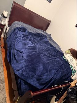 Dark wood bed frame and box spring