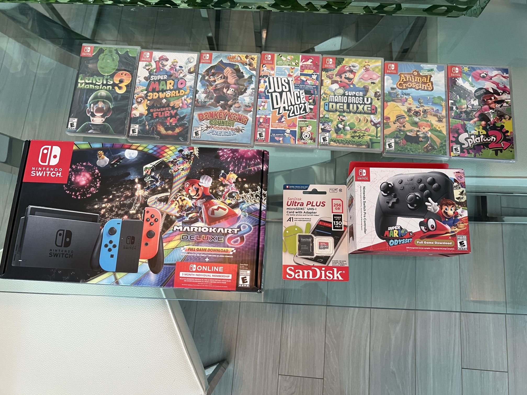 New/sealed Switch, 9 games, 1 extra controller, and a 256 GB card