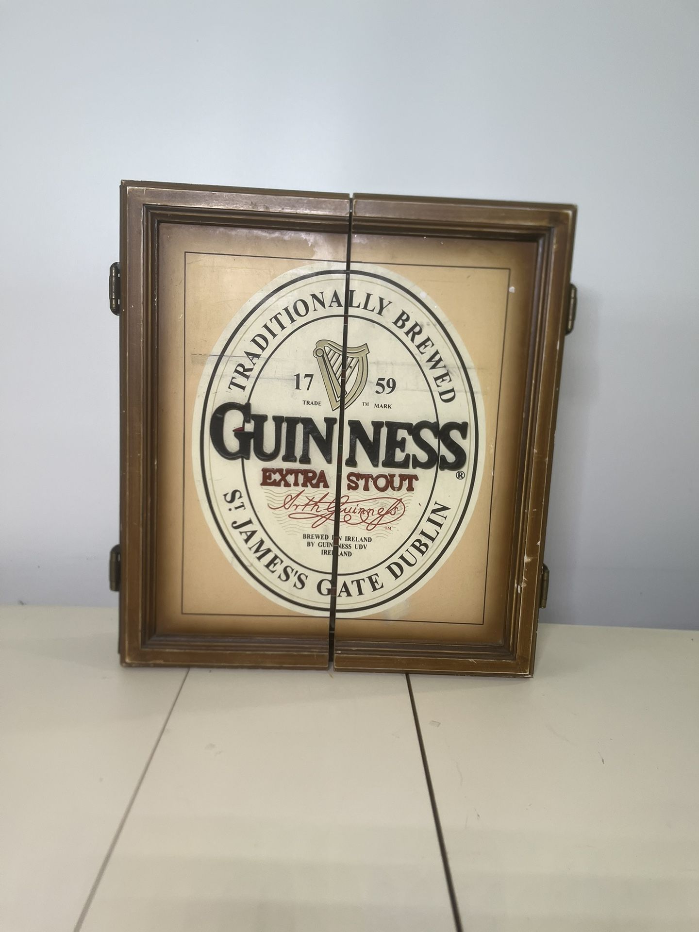 Guinness EXTRA STOUT Dart Board  And Cabinet No Darts. The cabinet and board was use only for display. The board had never been used and only shows di