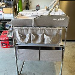 Changing table in great condition. Only used for a few months. Grey in color 