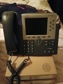 4 Brand new cisco office type multi line phones never used. Cost $500 each new.