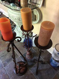 3 Tall candle holders and 1 short holder