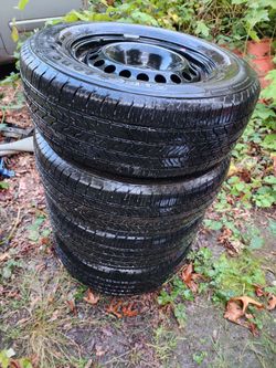 4 like new 235/65/16 tires and still wheels 2018 Chevy trax
