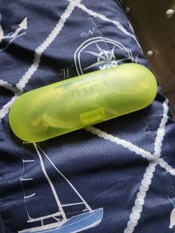 Two necklaces with fang pendants and beads.
A bracelet made of multicolored threads.