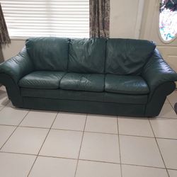 green leather sofa