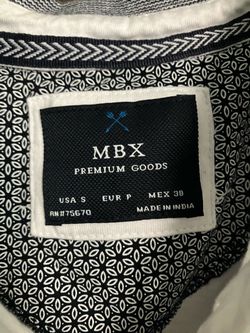 A white short button up from MBX