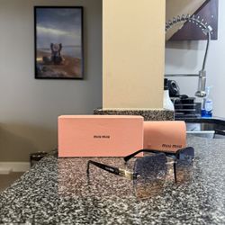 Miu miu Glasses