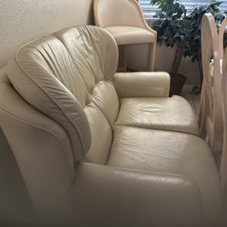 Beautiful, beige, leather loveseat