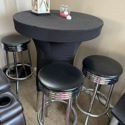 Bar Tables With Stools And Black Covers 