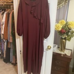 Handmade long sleeve overall with flowy wide leg style that is tailor made by clothing material bought myself. Did not fit me. It is size large 