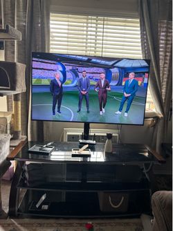65 in glass shelf tv sand
