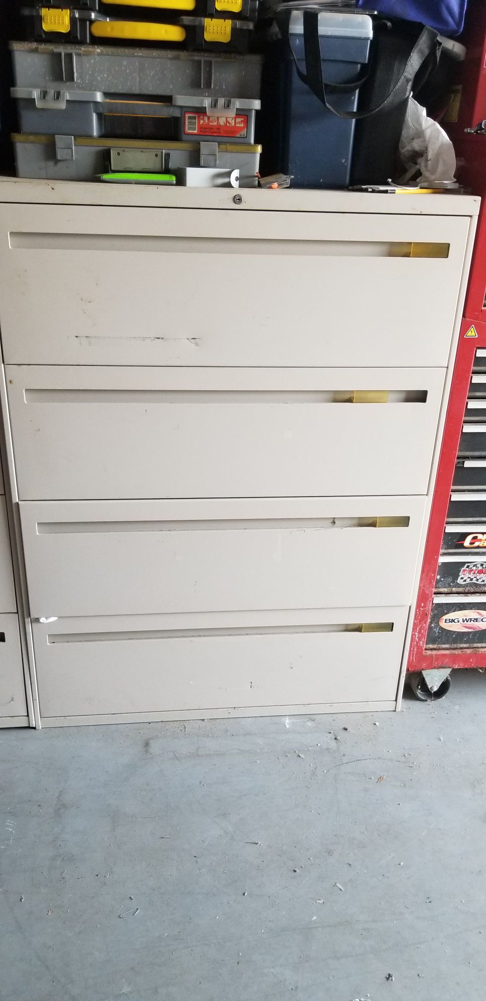 Two matching file cabinets 36" W - 49" T
