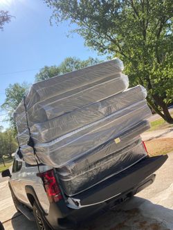 King pillowtop mattress and box spring new in plastic free delivery in Atlanta
