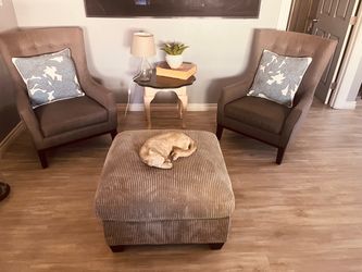 2 grey chairs on ottoman