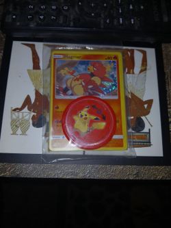 Sealed Magmar card and coin