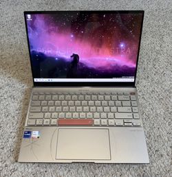 Selling a like-new ASUS ZenBook 14X OLED Space Edition (UX5401ZAS-XS99T) with an upgraded Intel AX210 Tri-Band Wi-Fi 6E and Bluetooth 5.3 card.