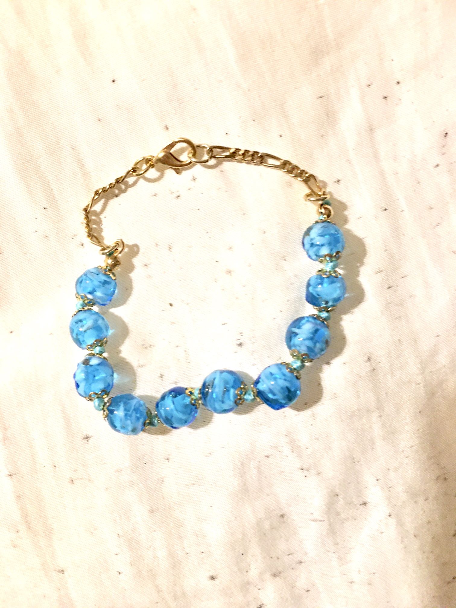 Turquoise Jem stone And Gold Braclet 